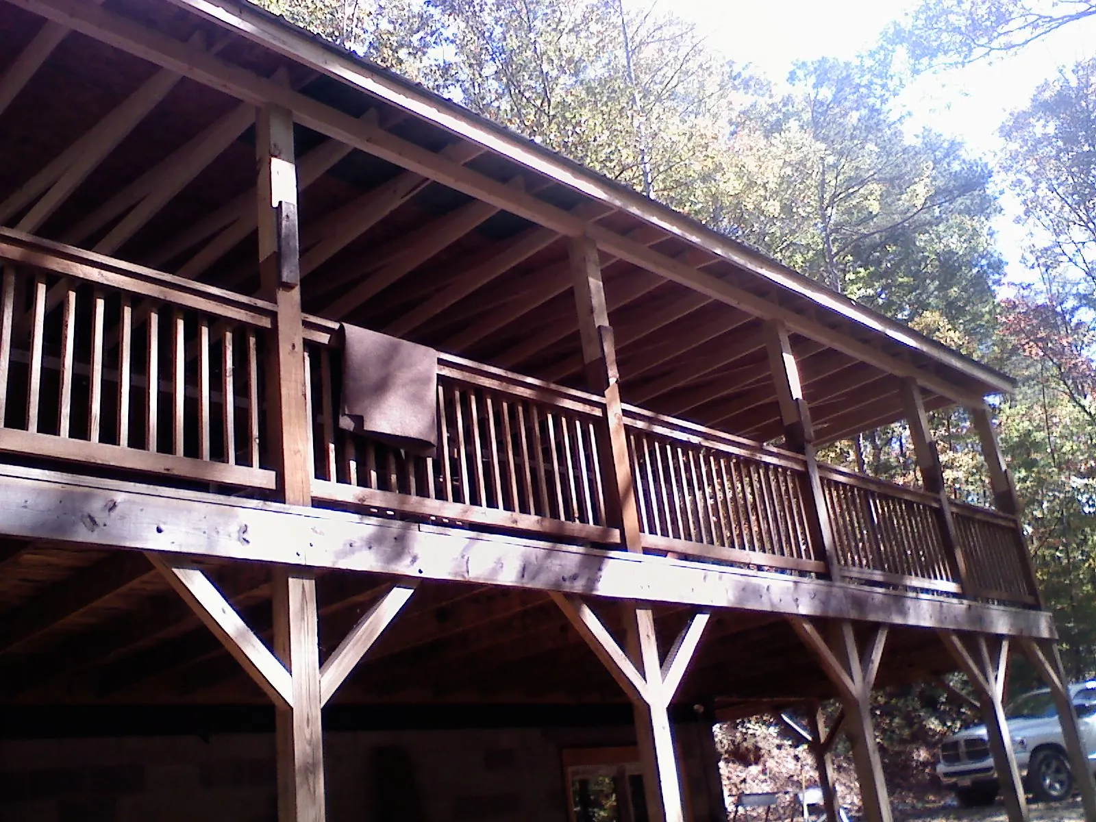 Timber framing under a new elevated porch and deck — Roof Leak Repair in Sterling Heights by Roofing Brothers